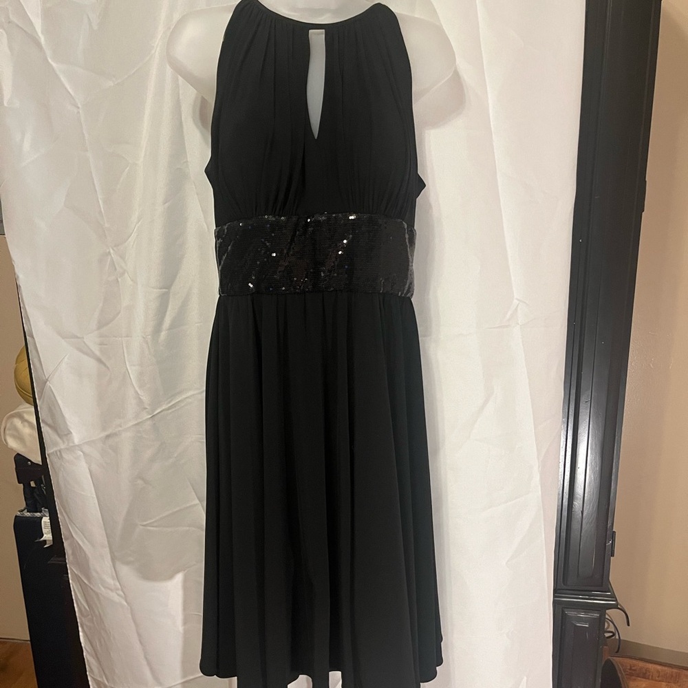 R & M Richard’s. Size 10. Worn once. Black with sequins. Beautiful!!!